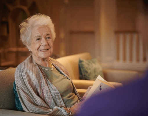 Old lady smiles.